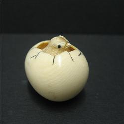 Early 20th C. carved ivory egg netsuke wit