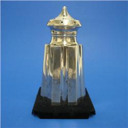 Sterling silver sugar shaker; faceted side