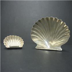 Two sterling silver clamshell dishes; one