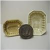 Image 1 : Two yellowware food molds and a wooden but