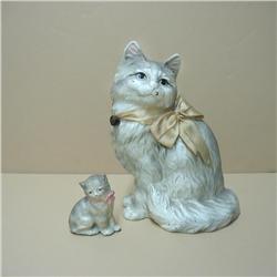 Hubley cast iron cat doorstop and a miniat