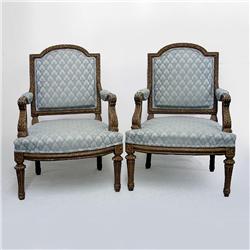 Pair of Louis IXV style fauteuils; carved