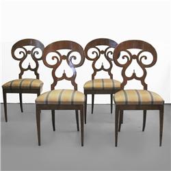 Set of four walnut side chairs; each with