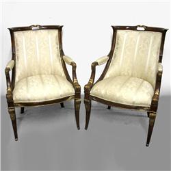 A pair of Egyptian Revival armchairs; cres