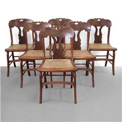 Set of six walnut side chairs; carved cres