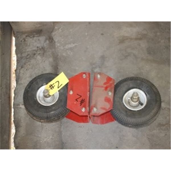 2 LARGE CASTORS ON RUBBER TIRES