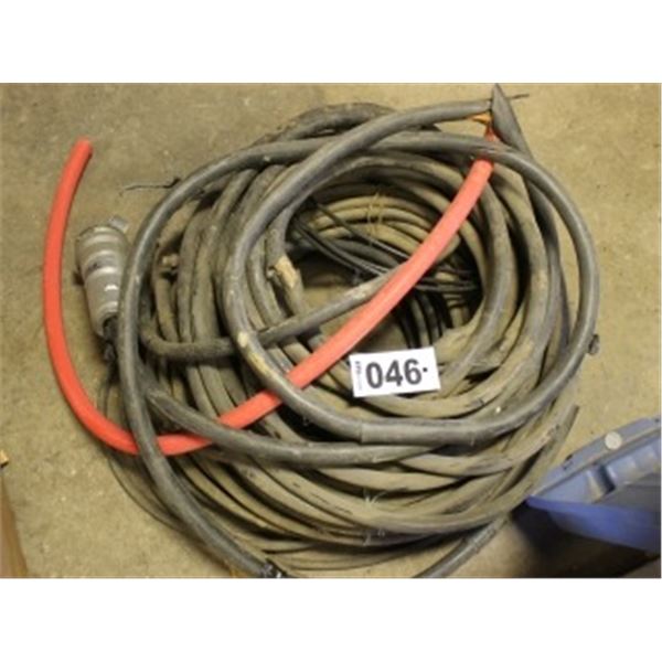 PILE OF VARIOUS ELECTRIC CORDS