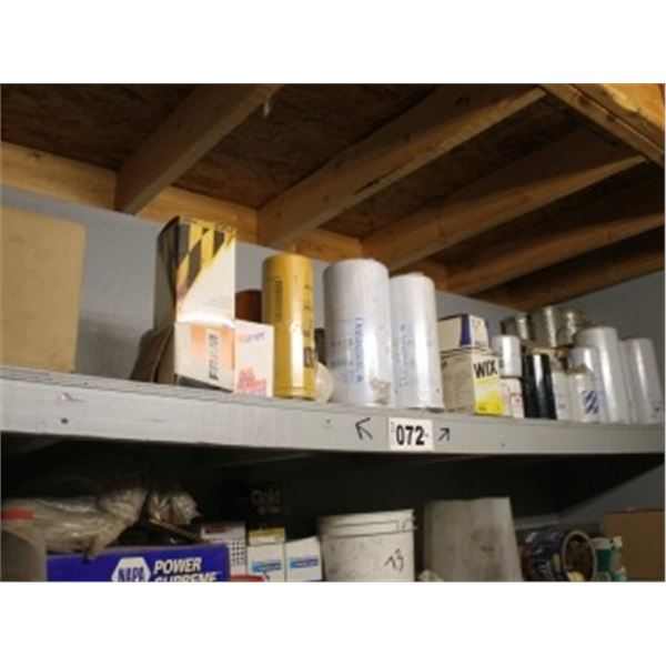 TOP SHELF OF ASSORTED OIL FILTERS