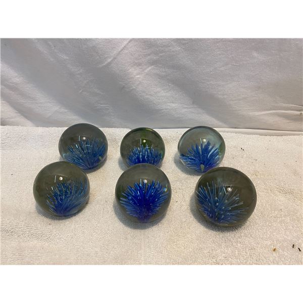Blue paper weights