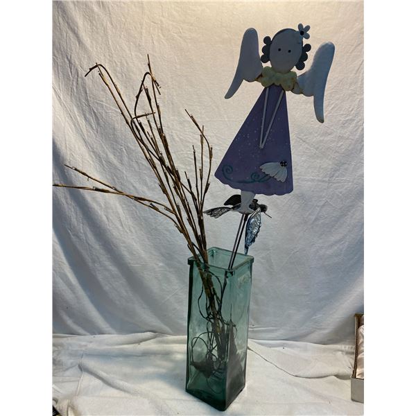 Vase, lights, and angel