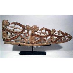 A FINE ASMAT CANOE PROW FRAGMENT,