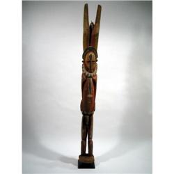 A MAPRIK ANCESTOR SCULPTURE,