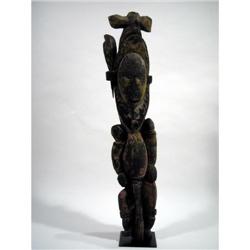 A MAPRIK ANCESTOR SCULPTURE,