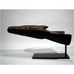 A SEPIK CANOE PROW FRAGMENT,