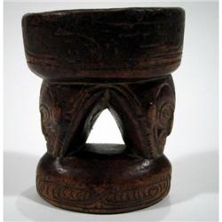 A LOWER SEPIK BETAL MORTAR,
