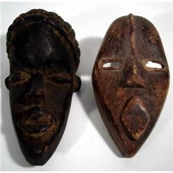 TWO DAN MINIATURE PASSPORT MASKS,