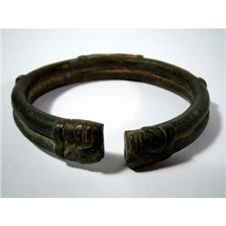 A FINE AND OLD DOGONG COPPER ALLOY BRACELET,