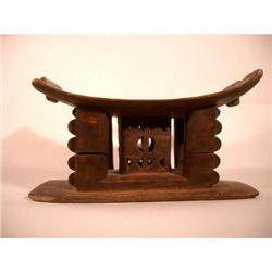 AN OLD ASHANTI STOOL,