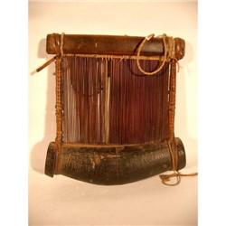 A FINE EARLY WEST AFRICAN WEAVERS BEATER,
