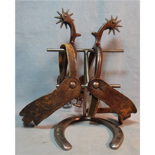 Buermann iron spurs w/chains, Miles City Saddlery straps, marked AB inside star