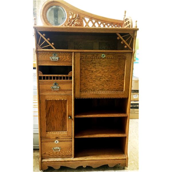 Fancy oak secretary, carved wood, beveled mirror
