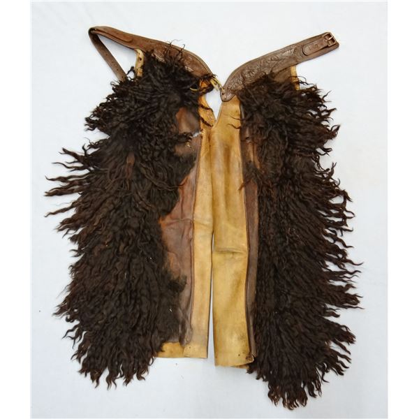 Black woolie chaps, unmarked, fair condition