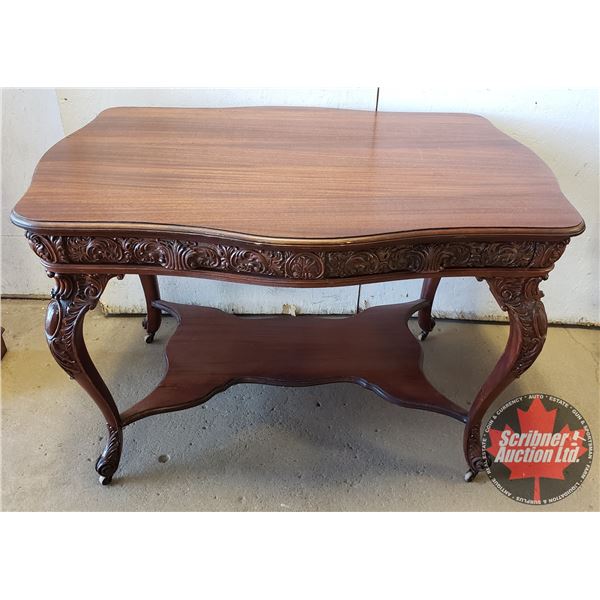 Intricately Carved Parlor Table / Writing Desk (2 Drawer) (on Castors) (30"H x 45"W x 32-1/2"D)