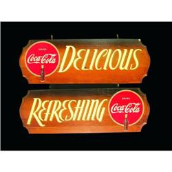 Two Coca Cola Kay Display Signs