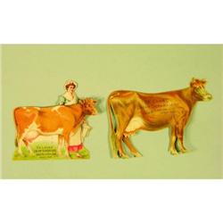 Two De Laval Die Cut Cardboard Cows