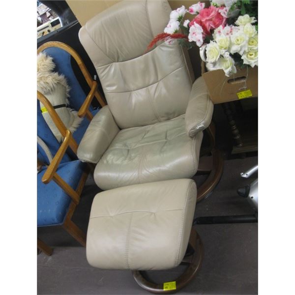 LEATHER TAN SWIVEL CHAIR WITH MATCHING OTTOMAN
