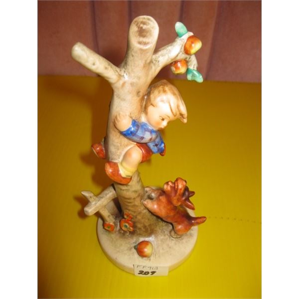 HUMMEL FIGURINE OF BOY UP A TREE BY DOG