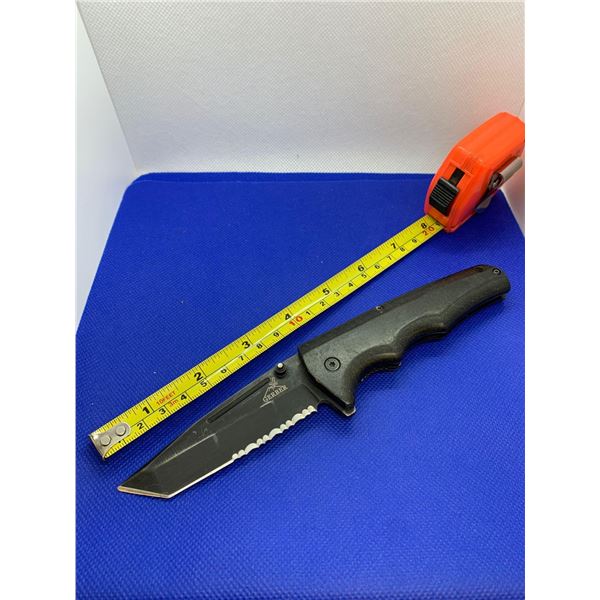 Gerber folding pocket knife.