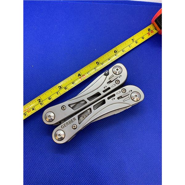 Gerber multi tool with 9 different tools.