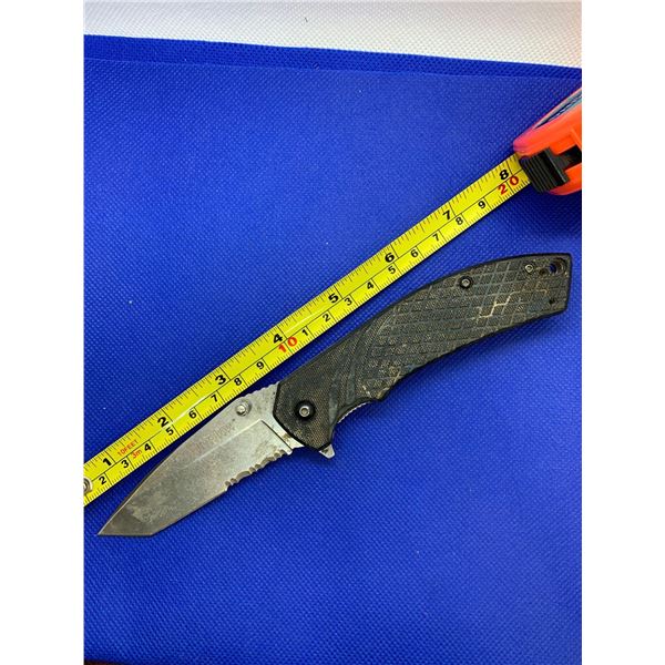 Kershaw folding pocket knife with clip.