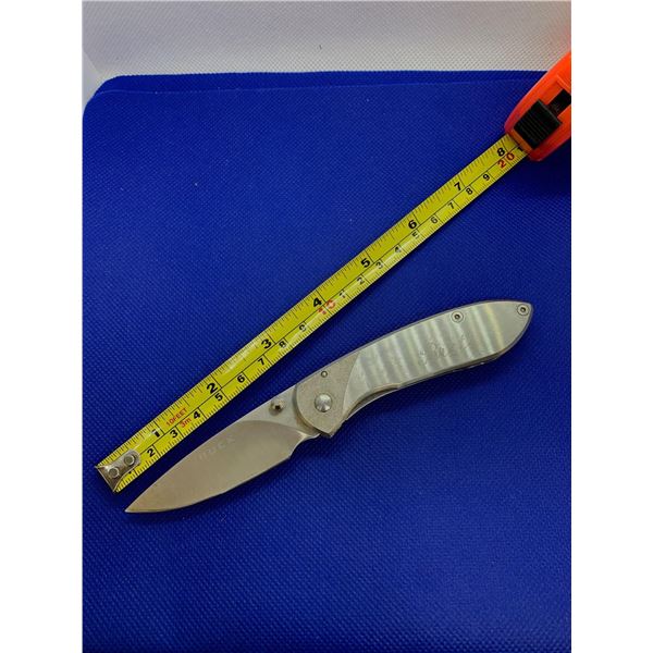 Buck folding pocket knife with clip.