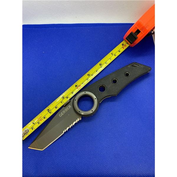 Gerber folding pocket knife with clip.