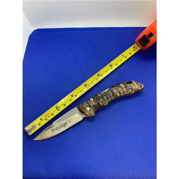 Buck folding pocket knife.