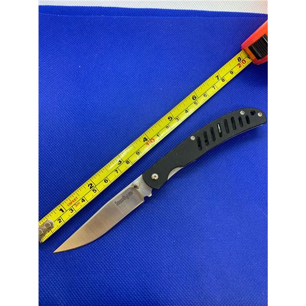 Kershaw folding pocket knife with clip.