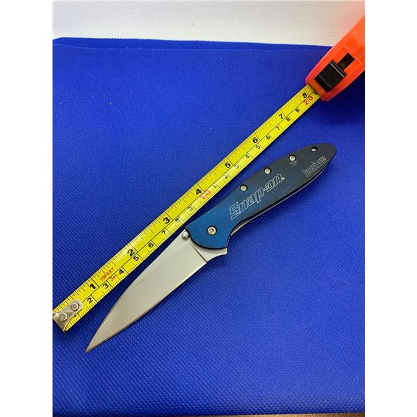 Kershaw folding pocket knife with clip.