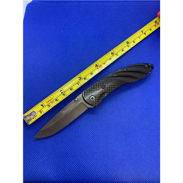 Kershaw folding pocket knife with clip.