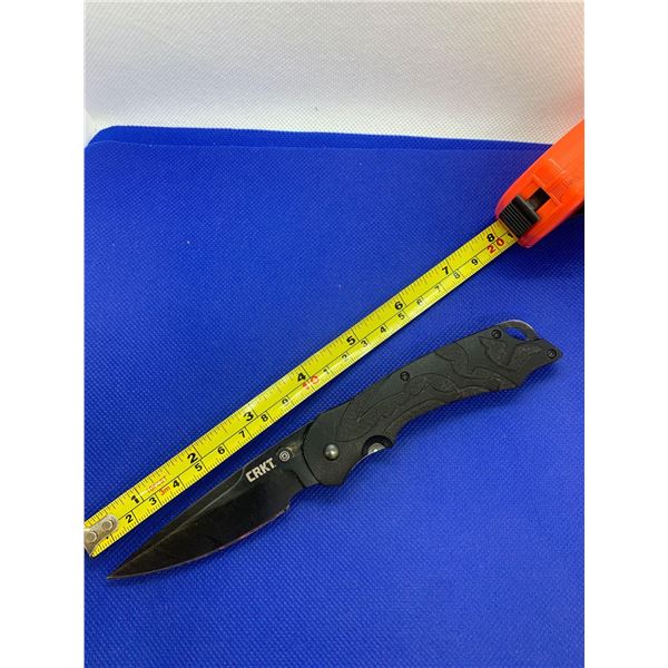 CRKT folding pocket knife with clip.