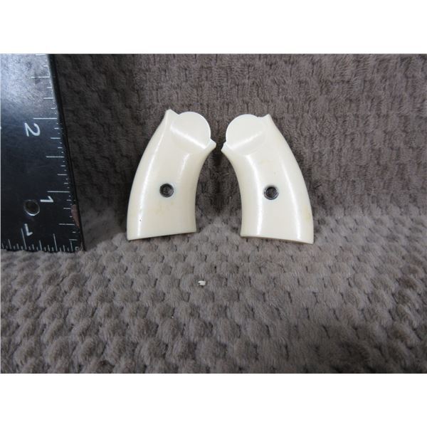 Unknown Small Ivory Coloured Pistol Grips