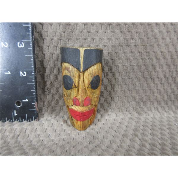 Indigenous Carving of Sto'lo Man by Chuck Kelly