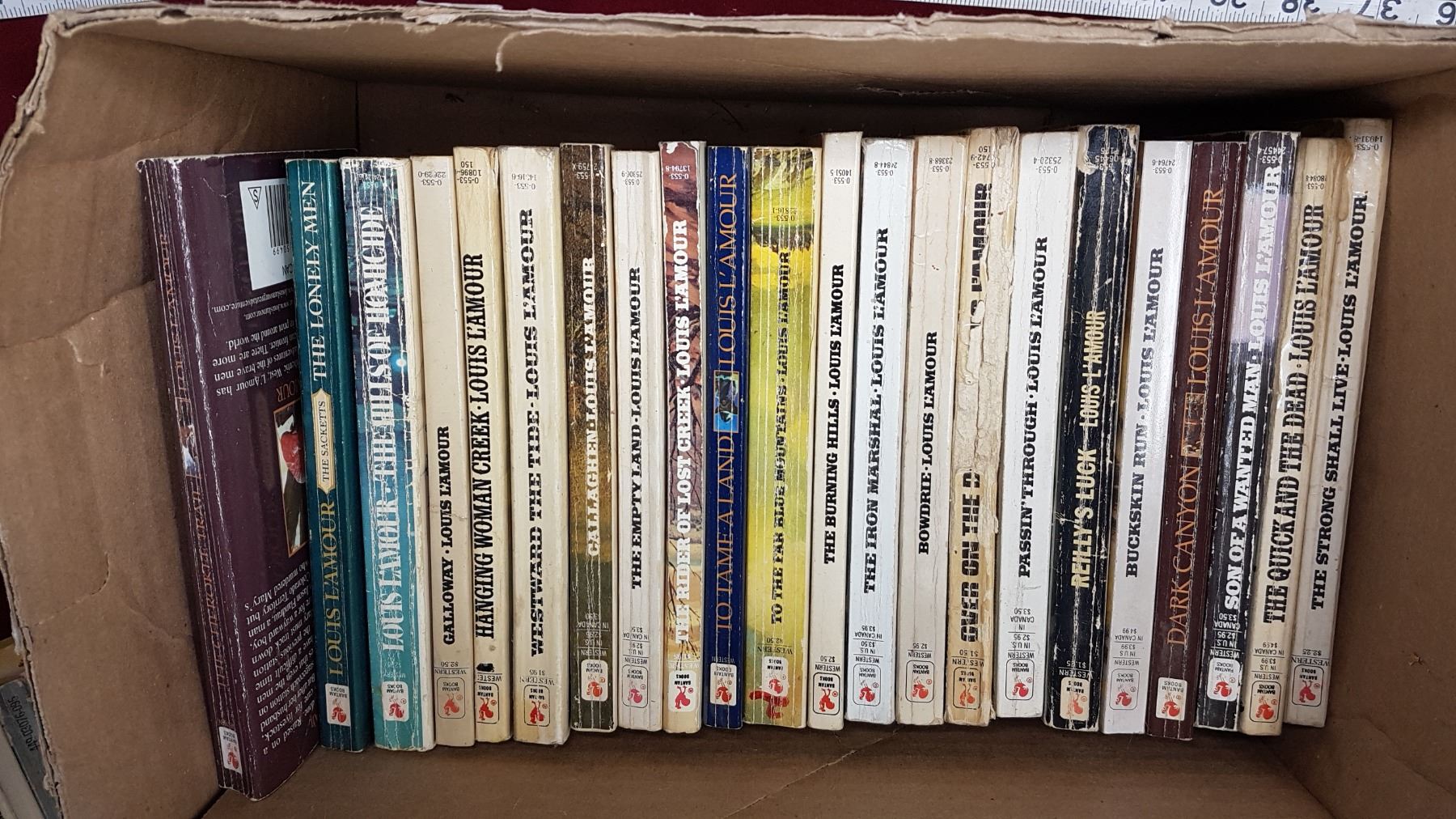 Lot Louis Lamour Books Schmalz Auctions lot-louis-lamour-books-schmalz-auctions