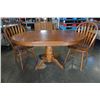 Image 2 : Round wood dining table with leaf and 2 chairs
