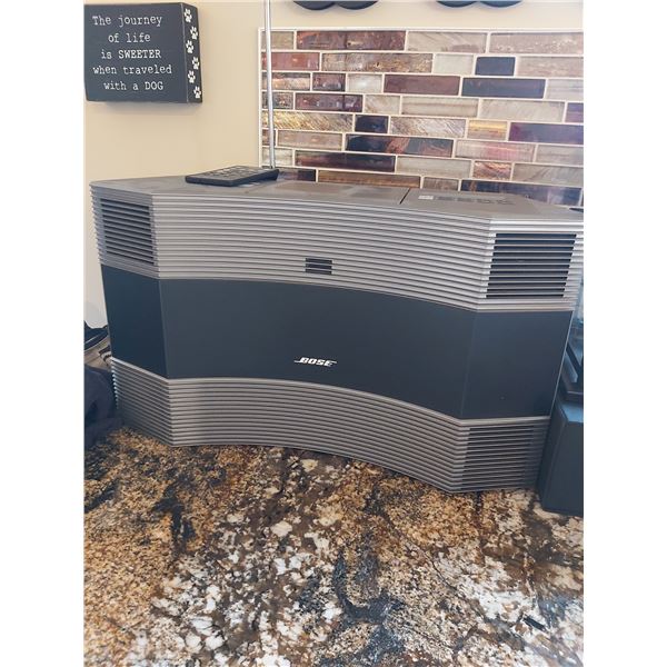 Silver and Black. Bose Acoustic Wave Music System II. Comes with remote control.