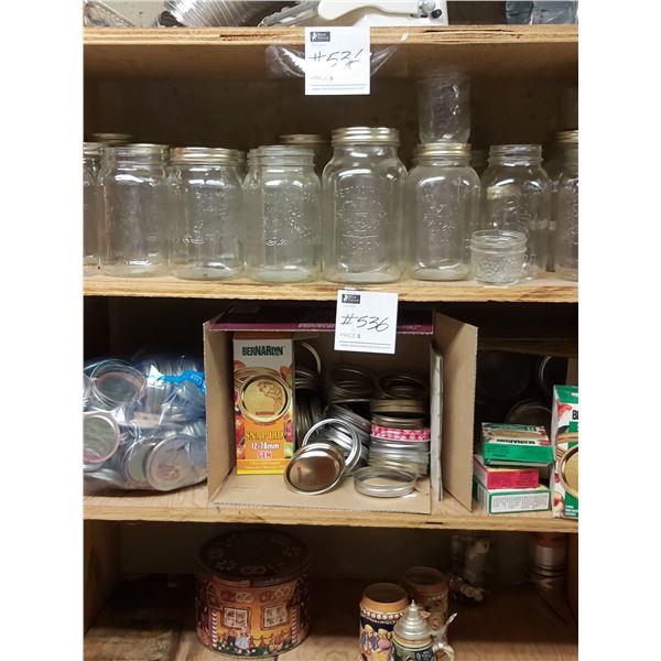 Approximately 65 Canning Jars, Lids & Labels. Assorted Sizes.
