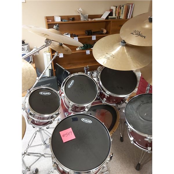 Approximately 19 Piece Evans Drum Set.