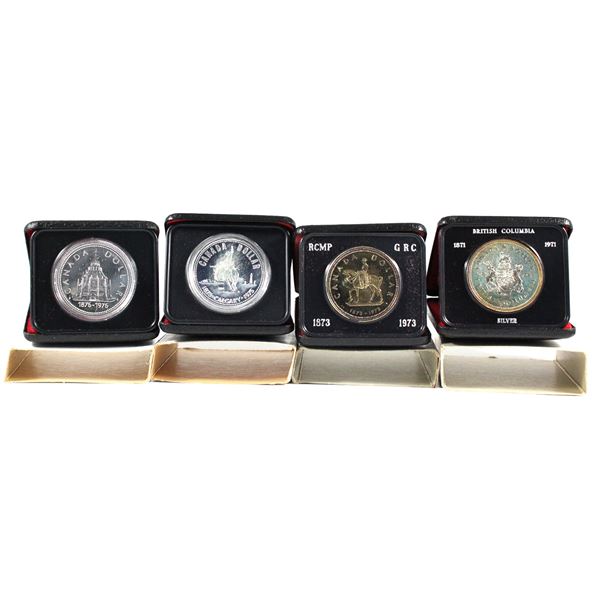 1971,1973,1975 & 1976 Canada Commemorative Specimen silver Dollars. packaging contains various imper