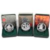 Image 1 : 2002-2004 Canada commemorative proof silver dollars.  Each coin comes in their original square capsu